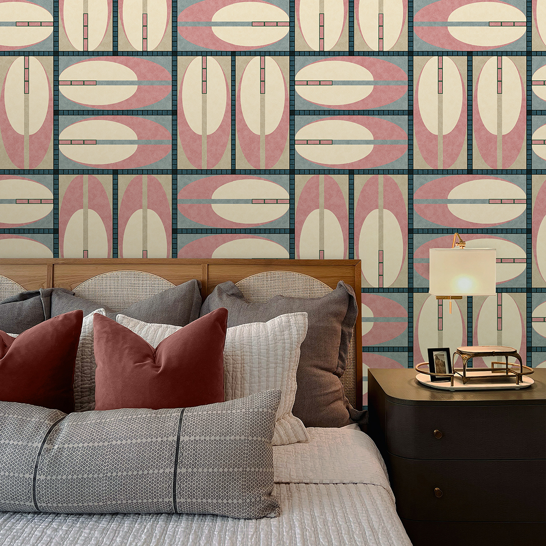 The artwork features a repeating geometric pattern of symmetrical shapes resembling elongated, curved diamonds or petals in various shades of blue and green. Each shape is split vertically with one half filled with a light blue and the other half filled with green or darker blue. The background is a light, almost pastel blue, which provides a soft yet vibrant backdrop. One of the blue shapes near the upper left contains a white starburst element, adding a focal point of brightness to the composition. The overall design conveys a modern, mid-century aesthetic with clean lines and harmonious color contrasts.